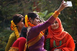 Bangladeshi girls taking Selfie at Pohela Falgun.jpg